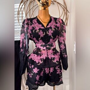 Chic Sheer Black Blouse with Pink Floral Design